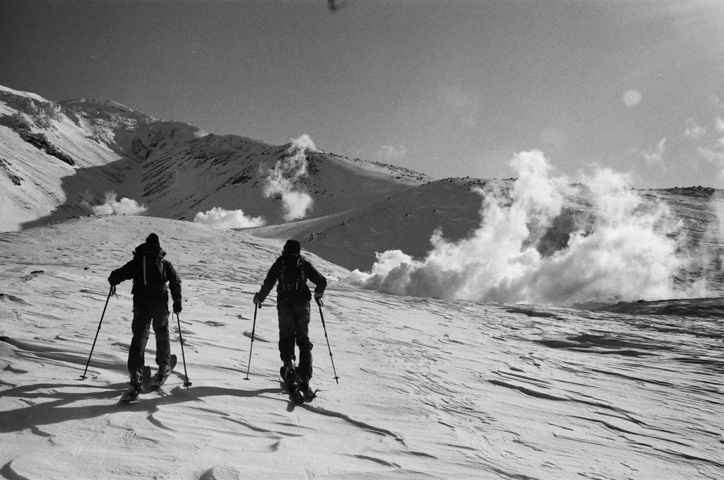 Carlo Gassner and Sebastian de Castelberg, skinning up an active volcano on Asahidake. © Nicolas Büchi